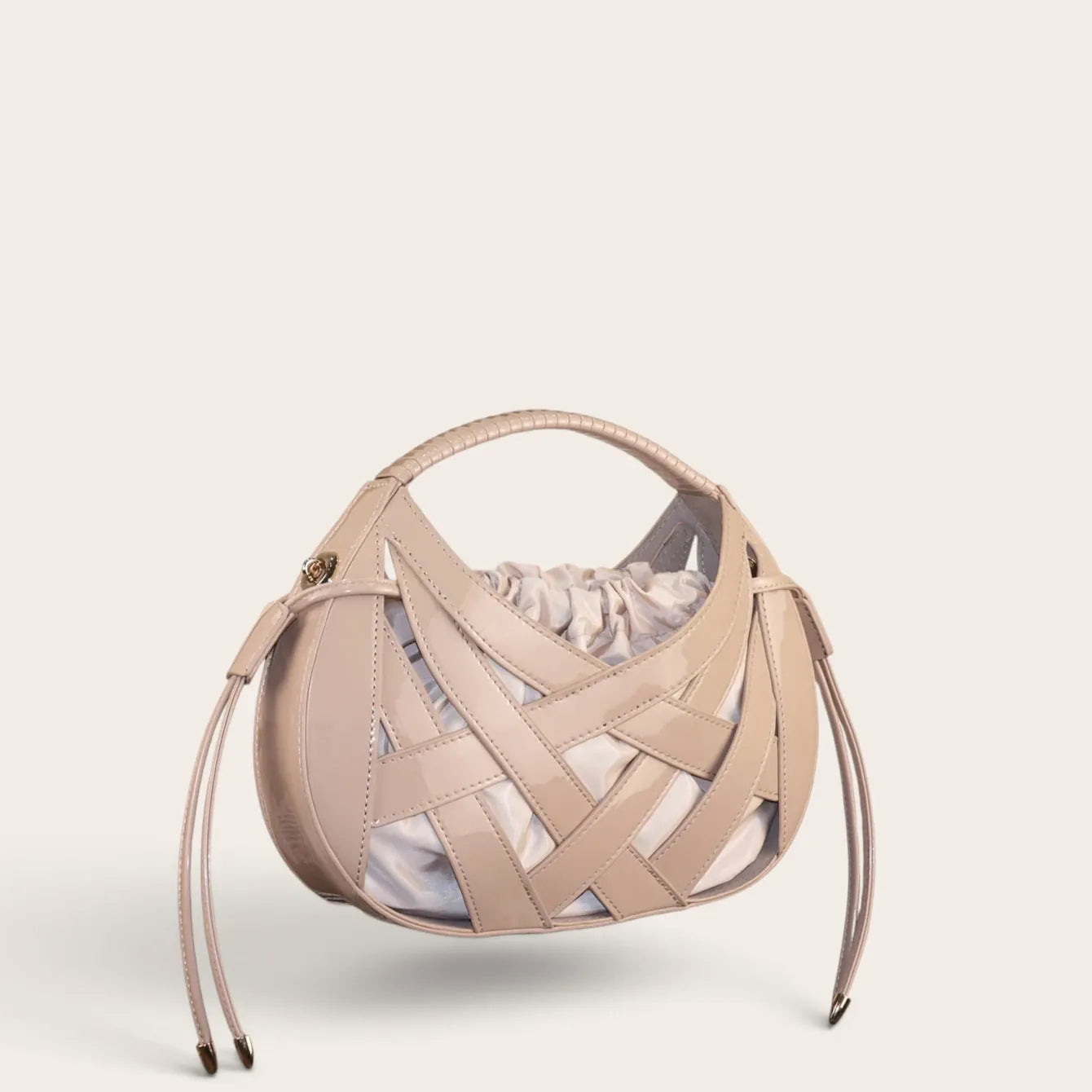 Sac a main cage cuir vegan tressé rond Abricot