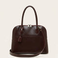 Sac bandoulière demi-lune en cuir glossé Marron