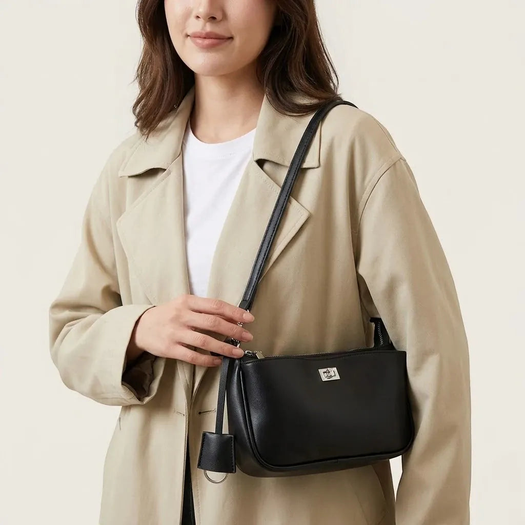 Sac bandoulière similicuir lisse manchette Noir