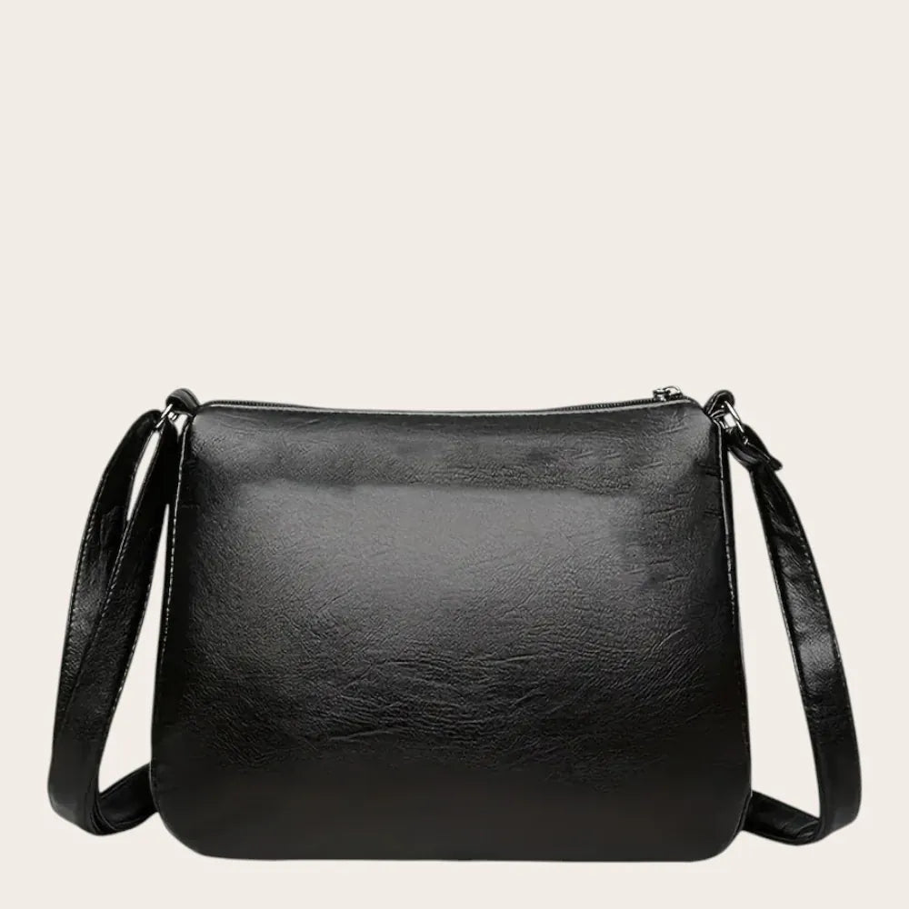 Sac bandoulière triple zippe en cuir vegan grainé