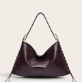 Sac hobo en cuir lacé Acajou