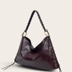 Sac hobo en cuir lacé Acajou