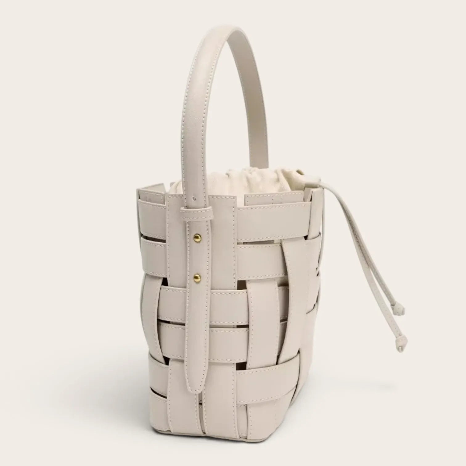 Sac seau cuir vegan tressé surpiqué