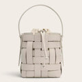 Sac seau cuir vegan tressé surpiqué