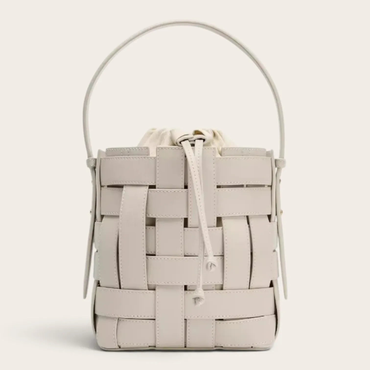 Sac seau cuir vegan tressé surpiqué