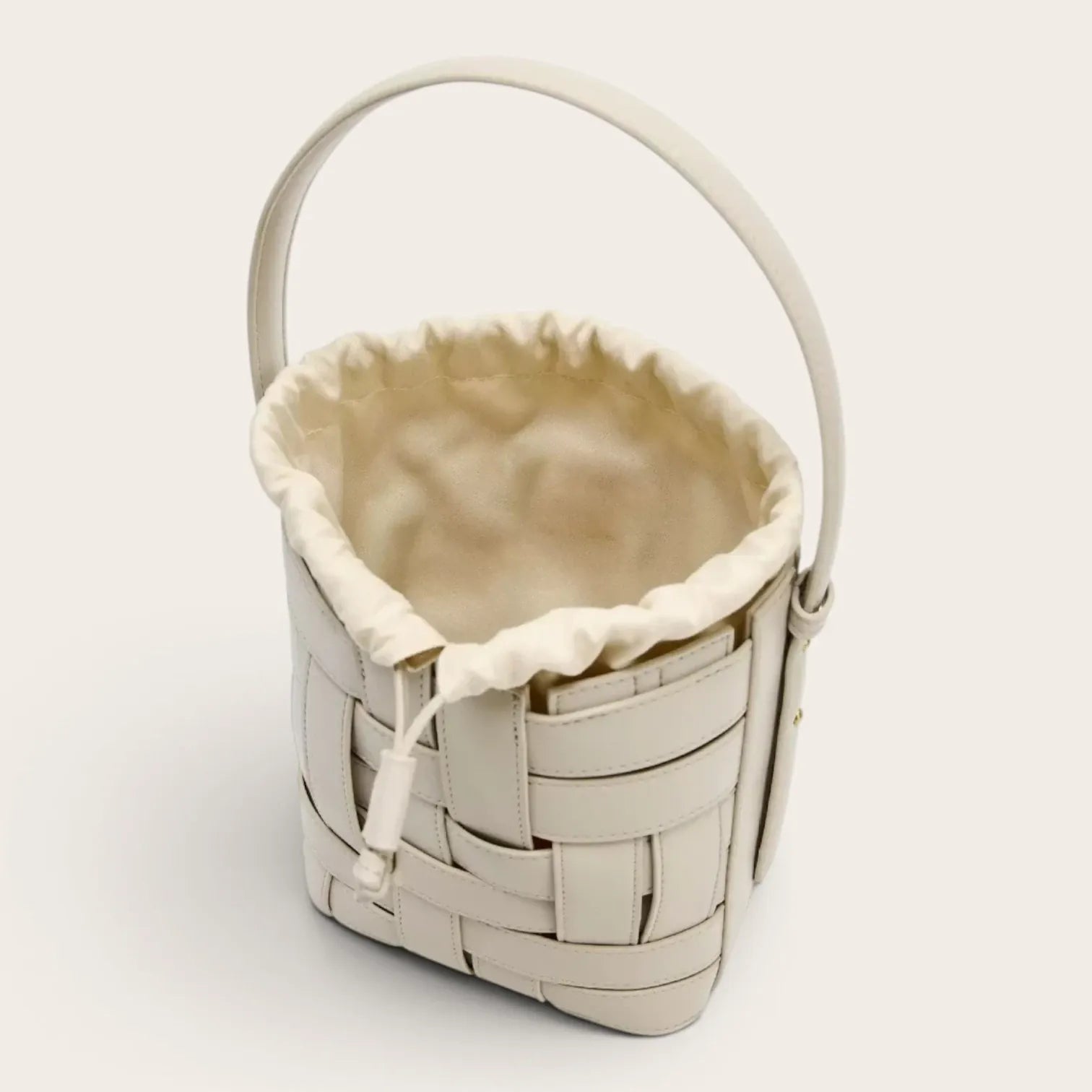 Sac seau cuir vegan tressé surpiqué